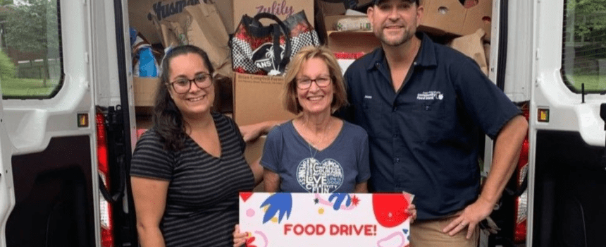 Pictured is food bank staff supporting Christine Patti who raised more than $53,000 and 4,700+ pounds of food in 2024. Her annual fundraiser to honor her son David T. Bannon has helped to provide thousands of meals to our neighbors.