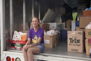 Candace, pictured at a recent mobile distribution, is grateful for the nutritious food your support helps provide to neighbors.