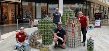 People standing around cans